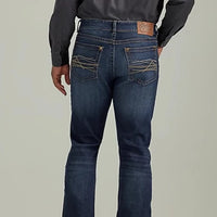 Wrangler Men's Rock 47 Slim Bootcut Jean in Duval