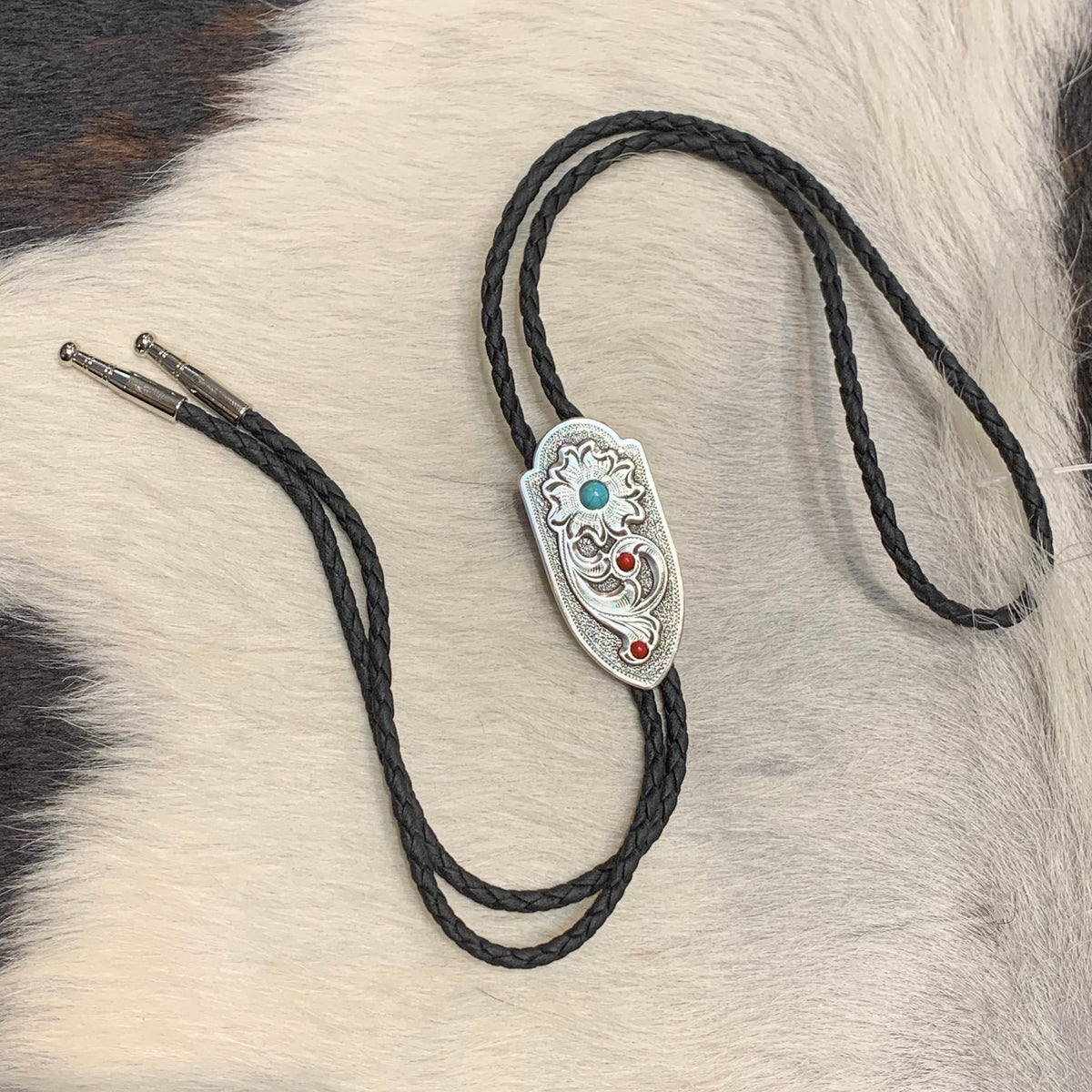 Double S Floral Arrowhead Bolo Tie