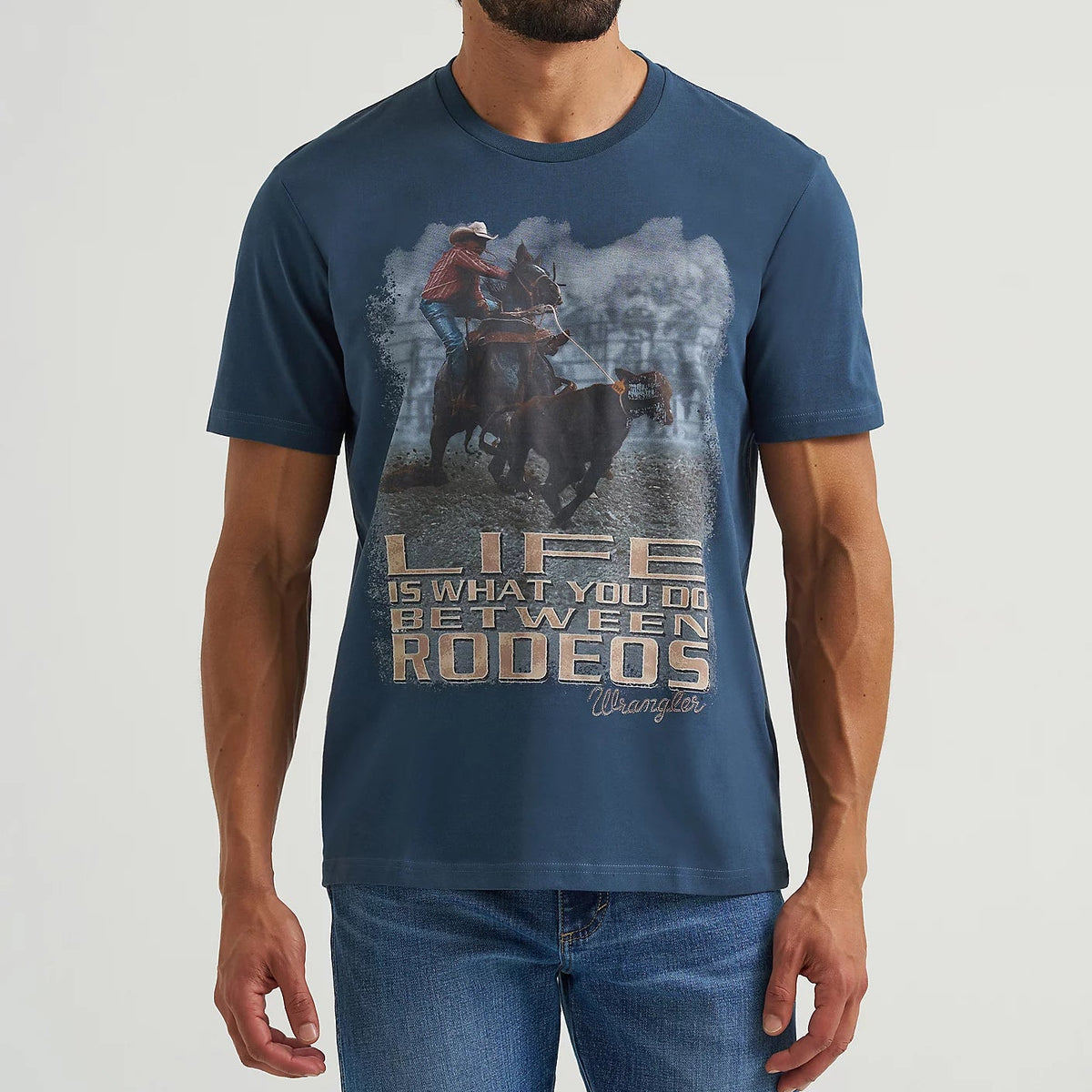 Wrangler Men's S/S Reissue Between Rodeos Graphic Tee in Rodeo Navy