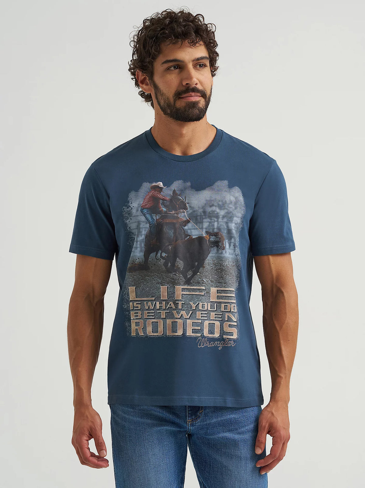 Wrangler Men's S/S Reissue Between Rodeos Graphic Tee in Rodeo Navy