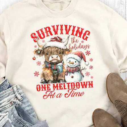 Women's Western Christmas Surviving One Meltdown Sweatshirt in Sweet Cream