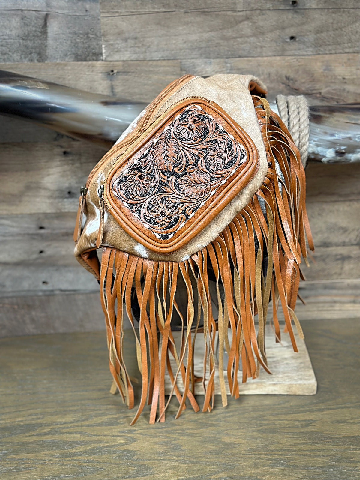 Cowhide And Chestnut Tooled Leather Sling Bag